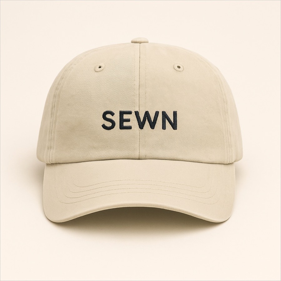 Dad hat in bone cotton twill, front panel embroidered.